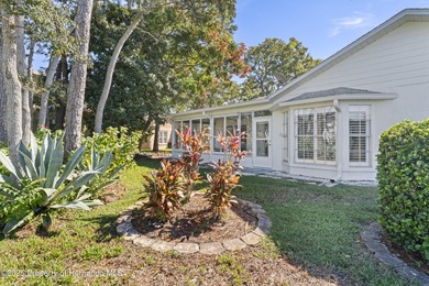 Step into this bright and inviting home featuring a formal on Timber Pines Golf Course in Florida - for sale on GolfHomes.com, golf home, golf lot