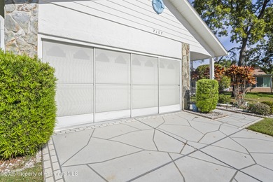Step into this bright and inviting home featuring a formal on Timber Pines Golf Course in Florida - for sale on GolfHomes.com, golf home, golf lot