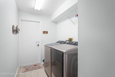 Step into this bright and inviting home featuring a formal on Timber Pines Golf Course in Florida - for sale on GolfHomes.com, golf home, golf lot