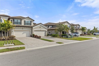 Unlock the door to luxury living in this exquisite coach home on Lakewood National Golf Club in Florida - for sale on GolfHomes.com, golf home, golf lot