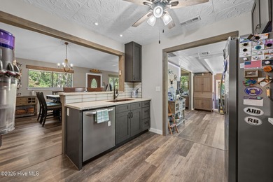 Welcome to 162 Quarterdeck Townes, a single-story townhome with on River Bend Golf and Country Club in North Carolina - for sale on GolfHomes.com, golf home, golf lot