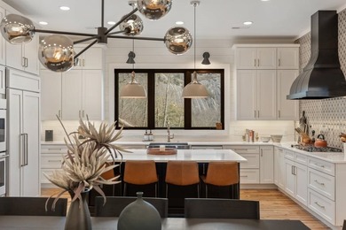 Completed in 2021, this beautifully crafted mountain home offers on Cullasaja Club in North Carolina - for sale on GolfHomes.com, golf home, golf lot