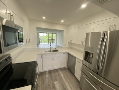 Beautifully just renovated 2 bedroom 2 bath  residence in The on The Country Club At Boca Raton in Florida - for sale on GolfHomes.com, golf home, golf lot