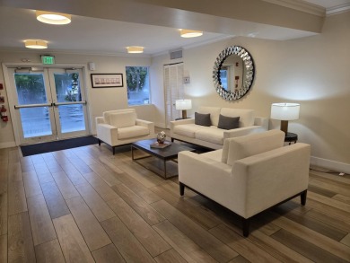 Rarely available 2/2 condo with 3 deeded parking spaces in one on Palm Beach Par-3 Golf Course in Florida - for sale on GolfHomes.com, golf home, golf lot