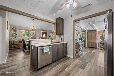 Welcome to 162 Quarterdeck Townes, a single-story townhome with on River Bend Golf and Country Club in North Carolina - for sale on GolfHomes.com, golf home, golf lot