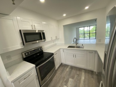 Beautifully just renovated 2 bedroom 2 bath  residence in The on The Country Club At Boca Raton in Florida - for sale on GolfHomes.com, golf home, golf lot