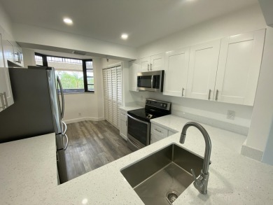 Beautifully just renovated 2 bedroom 2 bath  residence in The on The Country Club At Boca Raton in Florida - for sale on GolfHomes.com, golf home, golf lot