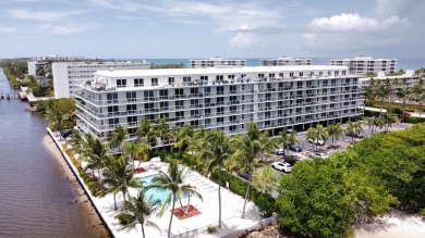 Rarely available 2/2 condo with 3 deeded parking spaces in one on Palm Beach Par-3 Golf Course in Florida - for sale on GolfHomes.com, golf home, golf lot