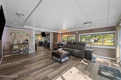 Welcome to 162 Quarterdeck Townes, a single-story townhome with on River Bend Golf and Country Club in North Carolina - for sale on GolfHomes.com, golf home, golf lot