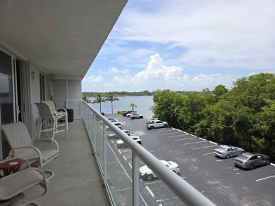 Rarely available 2/2 condo with 3 deeded parking spaces in one on Palm Beach Par-3 Golf Course in Florida - for sale on GolfHomes.com, golf home, golf lot
