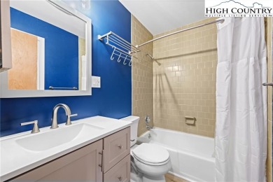 TURNKEY, SLOPESIDE condo overlooking Easy Street ski run and on Sugar Mountain Golf Course in North Carolina - for sale on GolfHomes.com, golf home, golf lot