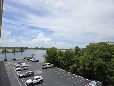 Rarely available 2/2 condo with 3 deeded parking spaces in one on Palm Beach Par-3 Golf Course in Florida - for sale on GolfHomes.com, golf home, golf lot