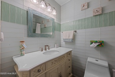 Welcome to 162 Quarterdeck Townes, a single-story townhome with on River Bend Golf and Country Club in North Carolina - for sale on GolfHomes.com, golf home, golf lot