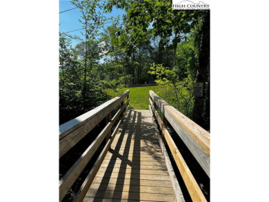 TURNKEY, SLOPESIDE condo overlooking Easy Street ski run and on Sugar Mountain Golf Course in North Carolina - for sale on GolfHomes.com, golf home, golf lot