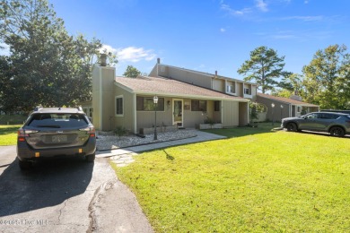 Welcome to 162 Quarterdeck Townes, a single-story townhome with on River Bend Golf and Country Club in North Carolina - for sale on GolfHomes.com, golf home, golf lot