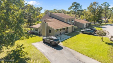 Welcome to 162 Quarterdeck Townes, a single-story townhome with on River Bend Golf and Country Club in North Carolina - for sale on GolfHomes.com, golf home, golf lot