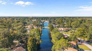 Welcome to 162 Quarterdeck Townes, a single-story townhome with on River Bend Golf and Country Club in North Carolina - for sale on GolfHomes.com, golf home, golf lot