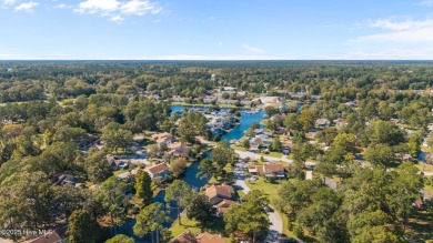 Welcome to 162 Quarterdeck Townes, a single-story townhome with on River Bend Golf and Country Club in North Carolina - for sale on GolfHomes.com, golf home, golf lot