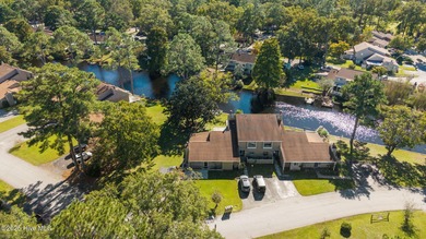 Welcome to 162 Quarterdeck Townes, a single-story townhome with on River Bend Golf and Country Club in North Carolina - for sale on GolfHomes.com, golf home, golf lot