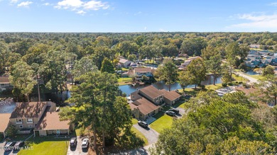 Welcome to 162 Quarterdeck Townes, a single-story townhome with on River Bend Golf and Country Club in North Carolina - for sale on GolfHomes.com, golf home, golf lot
