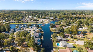 Welcome to 162 Quarterdeck Townes, a single-story townhome with on River Bend Golf and Country Club in North Carolina - for sale on GolfHomes.com, golf home, golf lot