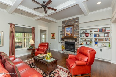 Situated along the fairways of the Woods Golf Course in on Whispering Woods in North Carolina - for sale on GolfHomes.com, golf home, golf lot