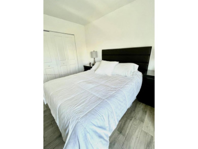 This stunning & totally remodeled corner unit with panoramic on Turnberry Isle Resort and Club in Florida - for sale on GolfHomes.com, golf home, golf lot