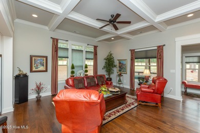 Situated along the fairways of the Woods Golf Course in on Whispering Woods in North Carolina - for sale on GolfHomes.com, golf home, golf lot