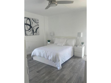 This stunning & totally remodeled corner unit with panoramic on Turnberry Isle Resort and Club in Florida - for sale on GolfHomes.com, golf home, golf lot