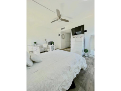 This stunning & totally remodeled corner unit with panoramic on Turnberry Isle Resort and Club in Florida - for sale on GolfHomes.com, golf home, golf lot