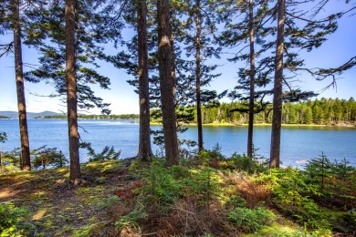 This parcel of waterfront land is perched up and out of the on Tarratine Golf Club in Maine - for sale on GolfHomes.com, golf home, golf lot