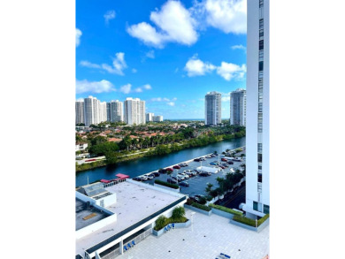 This stunning & totally remodeled corner unit with panoramic on Turnberry Isle Resort and Club in Florida - for sale on GolfHomes.com, golf home, golf lot