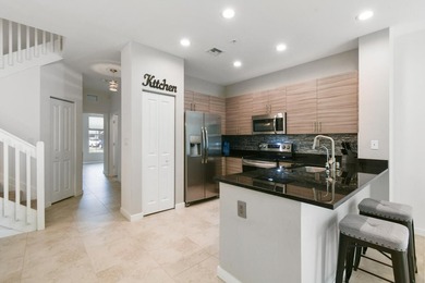 Beautifully maintained END-UNIT townhouse in a GATED community on Heritage Ridge Golf Club in Florida - for sale on GolfHomes.com, golf home, golf lot