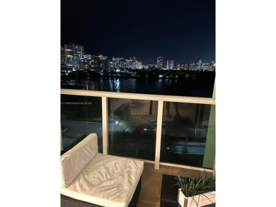 This stunning & totally remodeled corner unit with panoramic on Turnberry Isle Resort and Club in Florida - for sale on GolfHomes.com, golf home, golf lot