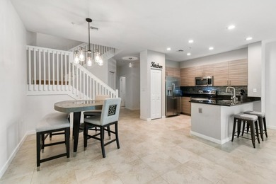 Beautifully maintained END-UNIT townhouse in a GATED community on Heritage Ridge Golf Club in Florida - for sale on GolfHomes.com, golf home, golf lot