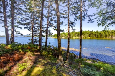 This parcel of waterfront land is perched up and out of the on Tarratine Golf Club in Maine - for sale on GolfHomes.com, golf home, golf lot