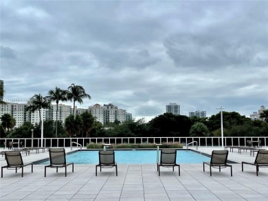 This stunning & totally remodeled corner unit with panoramic on Turnberry Isle Resort and Club in Florida - for sale on GolfHomes.com, golf home, golf lot