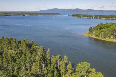 This parcel of waterfront land is perched up and out of the on Tarratine Golf Club in Maine - for sale on GolfHomes.com, golf home, golf lot