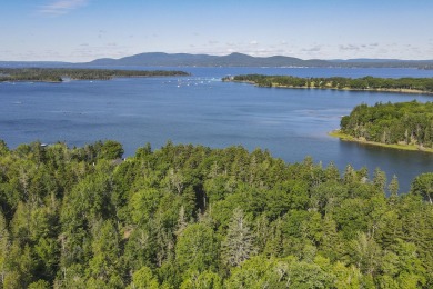 This parcel of waterfront land is perched up and out of the on Tarratine Golf Club in Maine - for sale on GolfHomes.com, golf home, golf lot