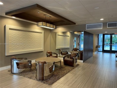 This stunning & totally remodeled corner unit with panoramic on Turnberry Isle Resort and Club in Florida - for sale on GolfHomes.com, golf home, golf lot
