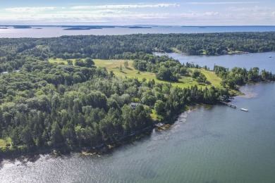 This parcel of waterfront land is perched up and out of the on Tarratine Golf Club in Maine - for sale on GolfHomes.com, golf home, golf lot