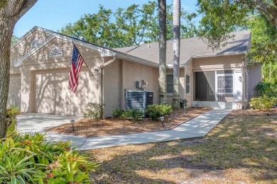 Charming End Unit Villa with brand-new 2024 Andersen Renewal on The Links of Lake Bernadette in Florida - for sale on GolfHomes.com, golf home, golf lot