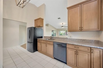 Charming End Unit Villa with brand-new 2024 Andersen Renewal on The Links of Lake Bernadette in Florida - for sale on GolfHomes.com, golf home, golf lot