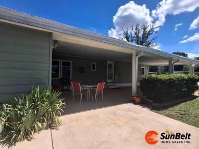 Corner Lot Gem with Golf Course Views in Rolling Greens Village! on Rolling Greens Executive Golf Community in Florida - for sale on GolfHomes.com, golf home, golf lot