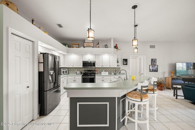 Experience luxury living in the highly sought-after, 55+ gated on Heritage Pines Country Club in Florida - for sale on GolfHomes.com, golf home, golf lot