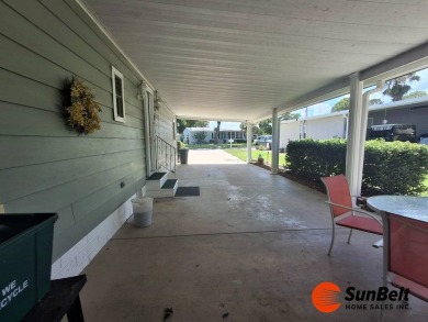 Corner Lot Gem with Golf Course Views in Rolling Greens Village! on Rolling Greens Executive Golf Community in Florida - for sale on GolfHomes.com, golf home, golf lot