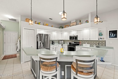 Experience luxury living in the highly sought-after, 55+ gated on Heritage Pines Country Club in Florida - for sale on GolfHomes.com, golf home, golf lot