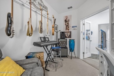 Cute Cottage by the Blue Guitar Park - Margaritaville Magic on LPGA International Golf Course in Florida - for sale on GolfHomes.com, golf home, golf lot
