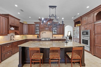 This elegant executive brick home offers luxury living and on Shiloh Falls Golf Club in Tennessee - for sale on GolfHomes.com, golf home, golf lot