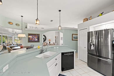 Experience luxury living in the highly sought-after, 55+ gated on Heritage Pines Country Club in Florida - for sale on GolfHomes.com, golf home, golf lot